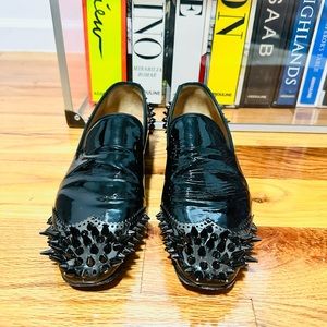 Christian Louboutin TYRONITO spiked wingtip loafer in Patent leather